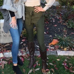 green paper bag pants